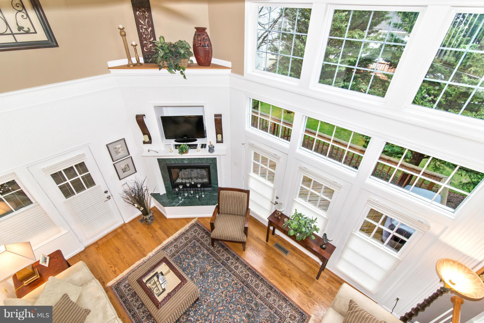 2519 Bear Den Road Frederick, MD 21701 - Photo 13 of 30 a living room with furniture and a fireplace