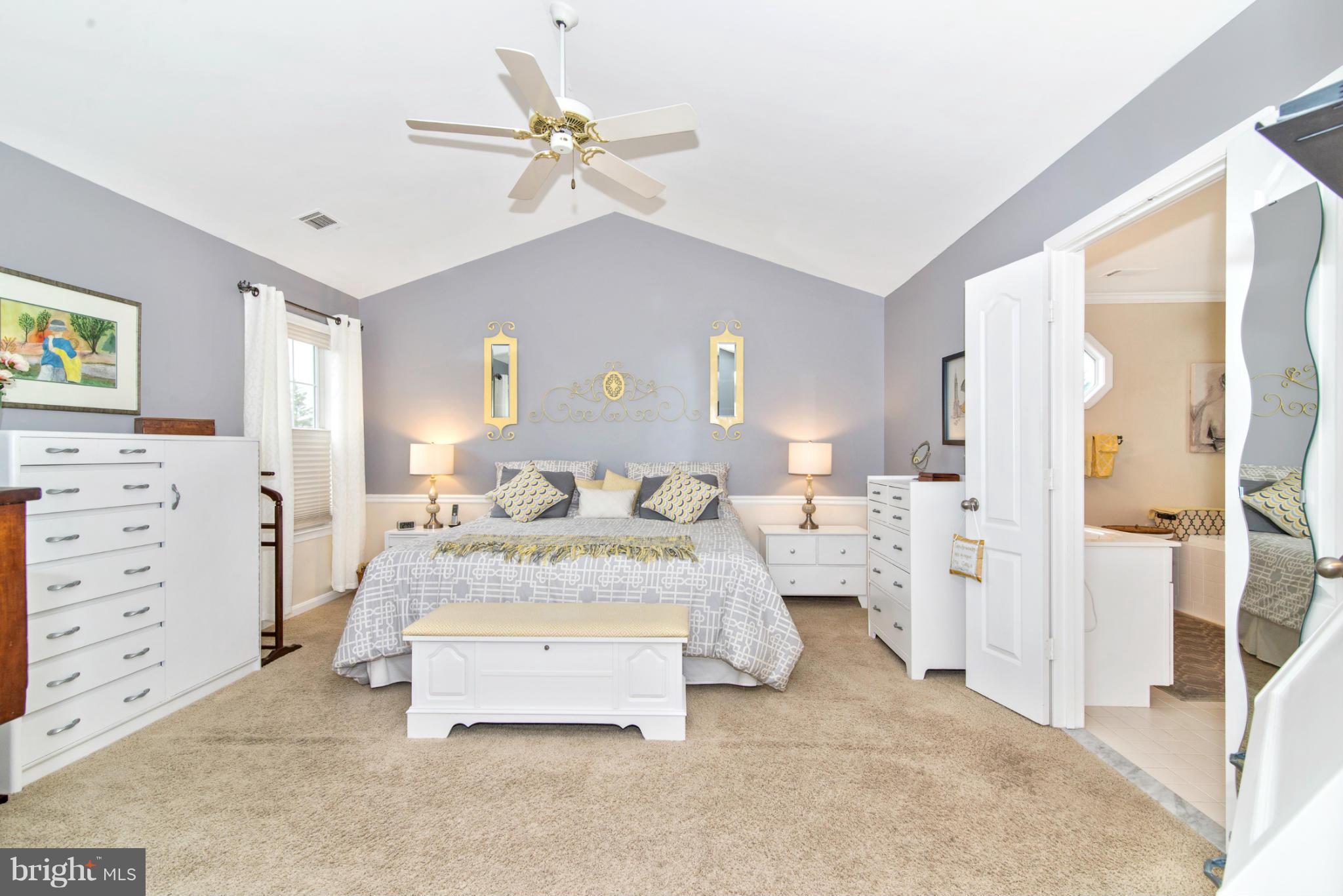 2519 Bear Den Road Frederick, MD 21701 - Photo 21 of 30 a bedroom with a bed and a dresser