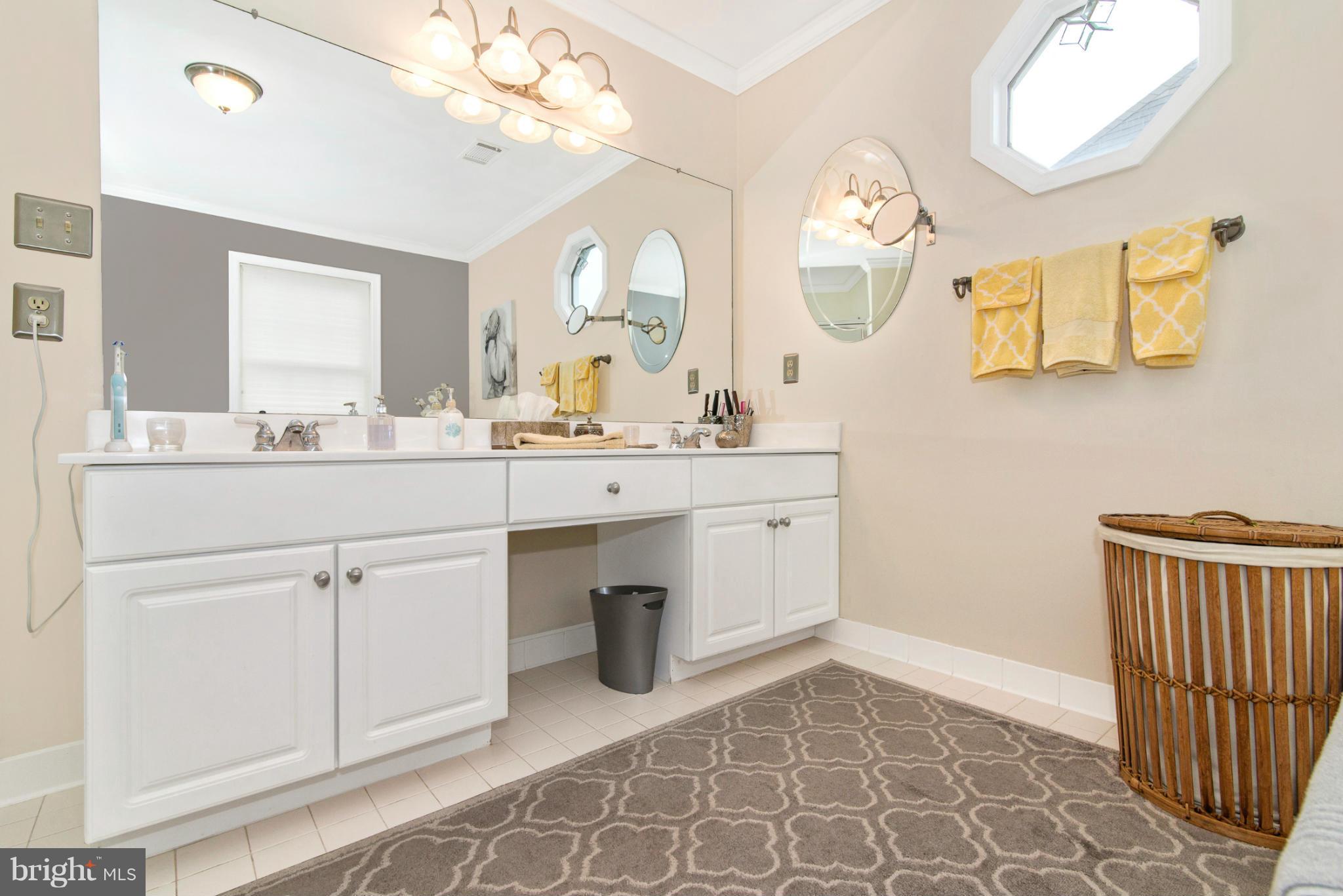 2519 Bear Den Road Frederick, MD 21701 - Photo 22 of 30 a spacious bathroom with a double vanity sink mirror and