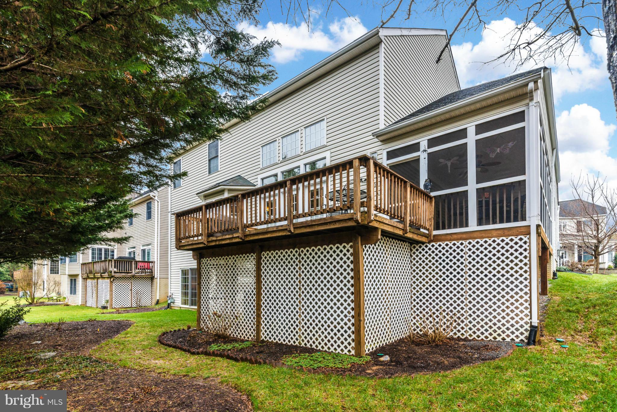 2519 Bear Den Road Frederick, MD 21701 - Photo 5 of 30 a view of a house with a yard and deck