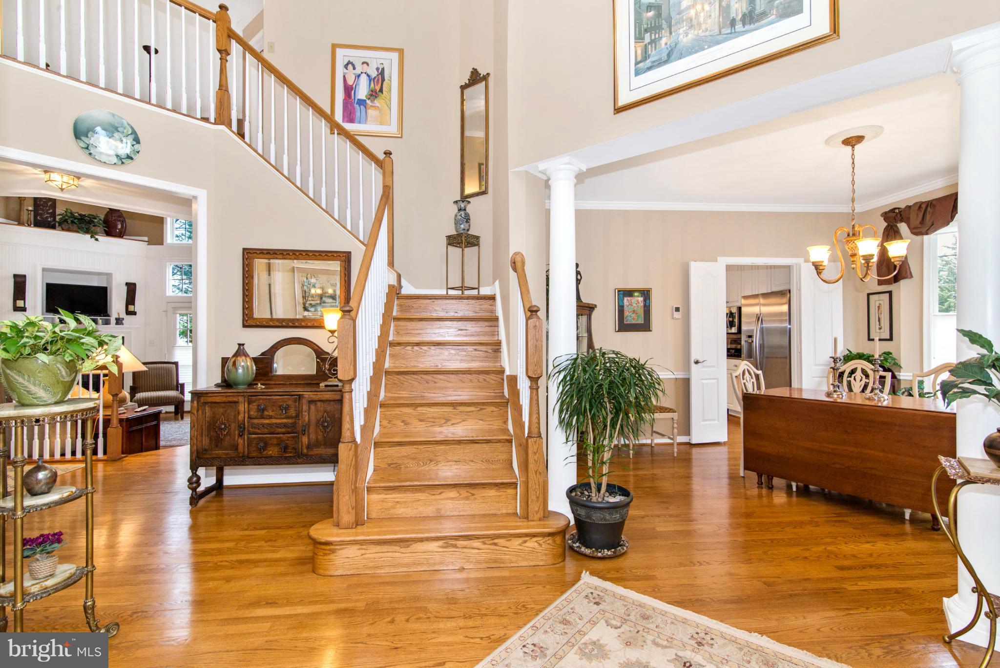 2519 Bear Den Road Frederick, MD 21701 - Photo 7 of 30 a view of an entryway with wooden floor and a livingroom