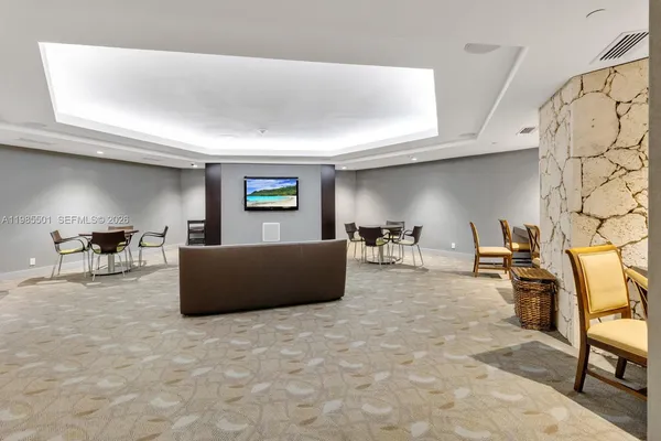 a living room with furniture and a couch