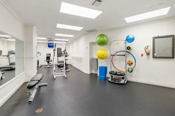 a view of a room with gym equipment