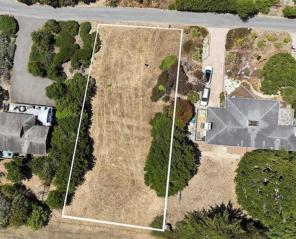 an aerial view of a house with a garden