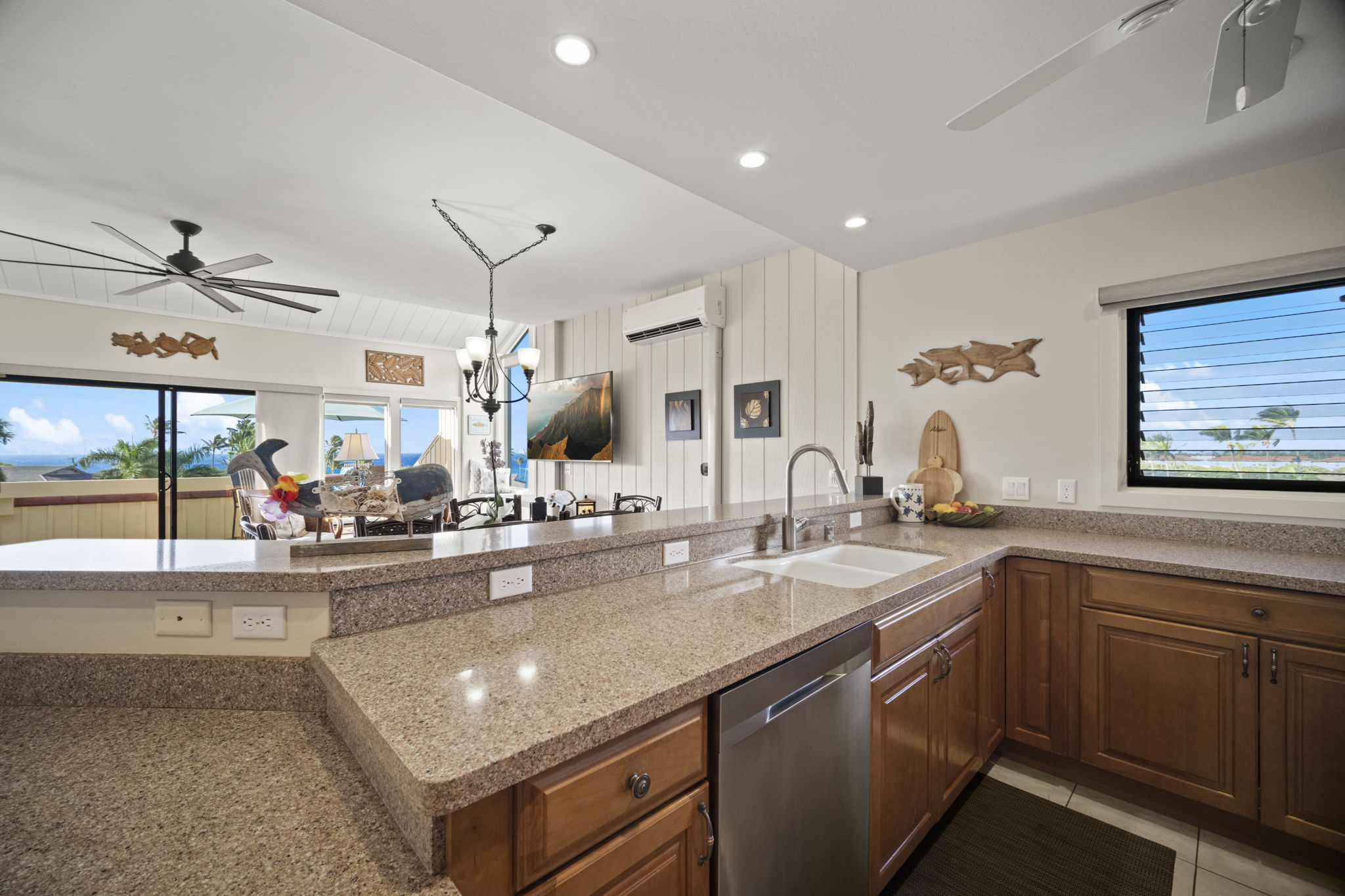 2371 Ho'ohu Road, Unit 610 Koloa, HI 96756 - Photo 8 of 29 a kitchen with sink stove and cabinets