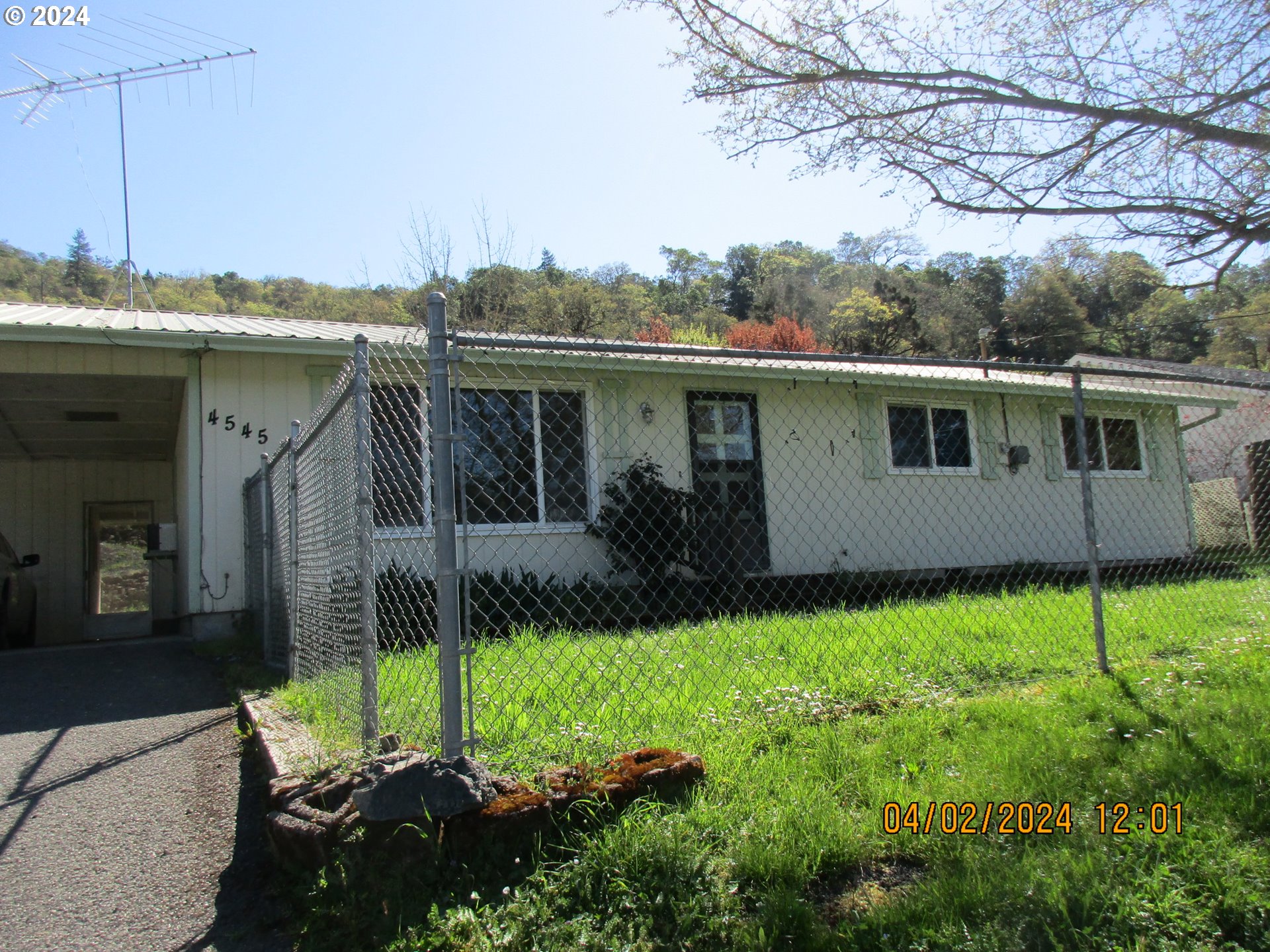 4545 Northeast Ridenour Street Winchester, OR 97495 - Photo 2 of 20 a view of a back yard of the house