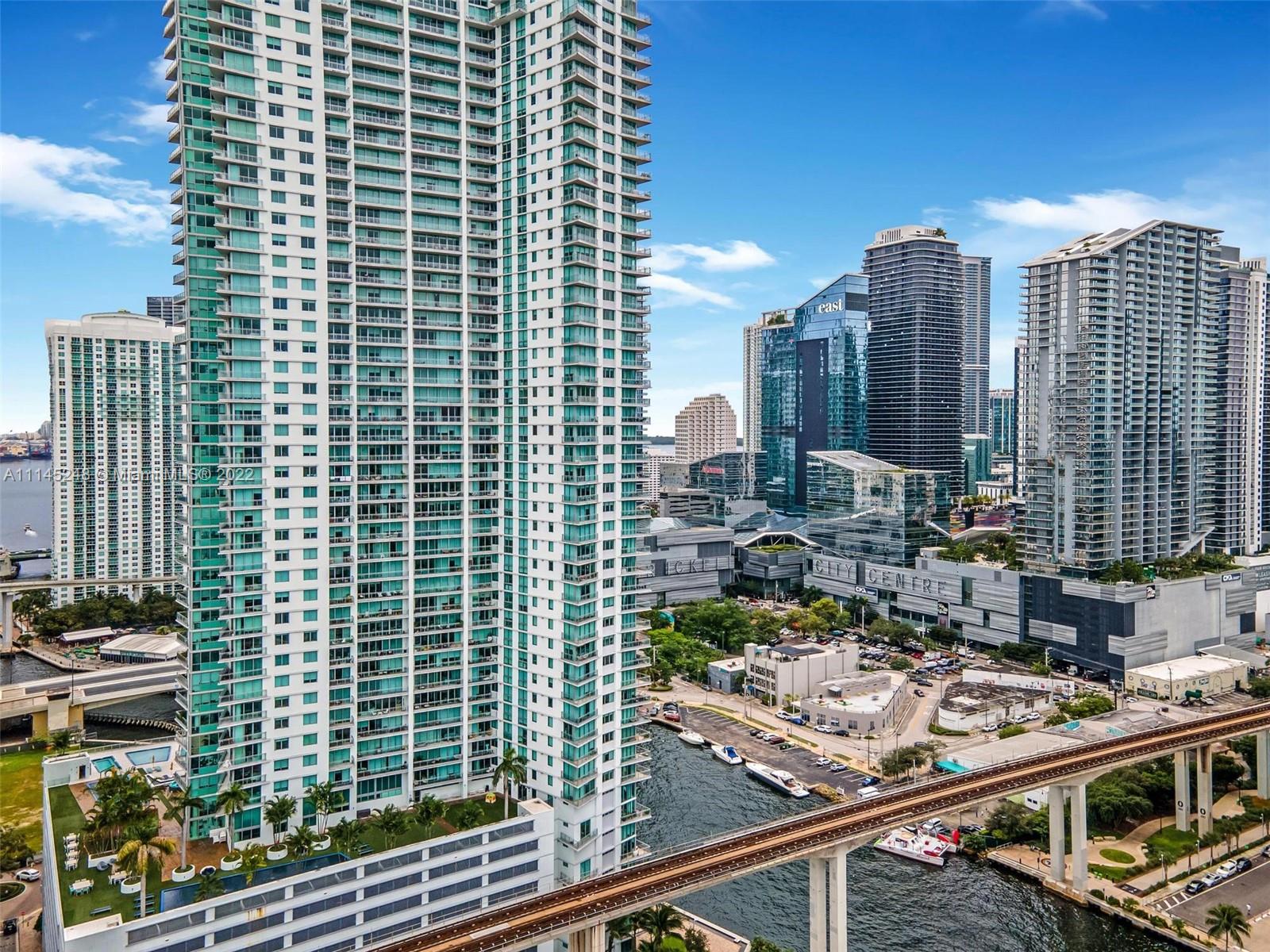 92 Southwest 3rd Street, Unit 901 Miami, FL 33130 - Photo 31 of 35 a view of a city with tall buildings