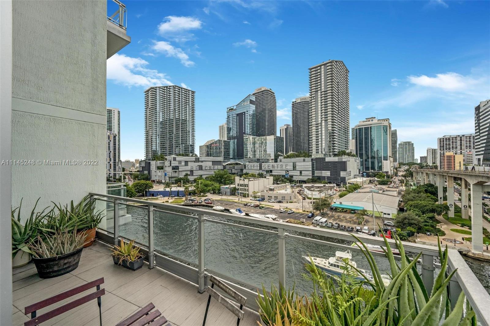 92 Southwest 3rd Street, Unit 901 Miami, FL 33130 - Photo 6 of 35 a view of a city with tall buildings