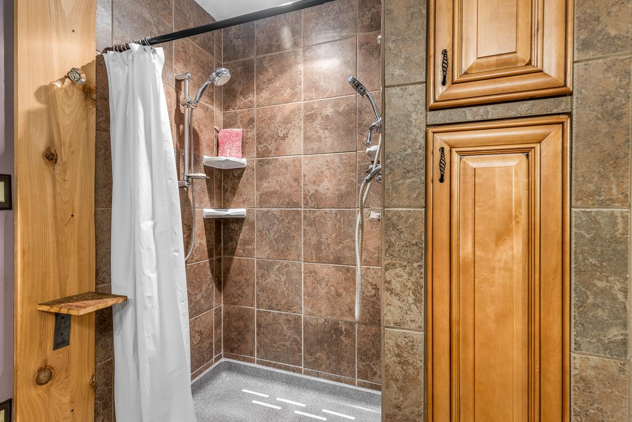 17097 Goodrich Road Davis, IL 61019 - Photo 40 of 45 a bathroom with a shower