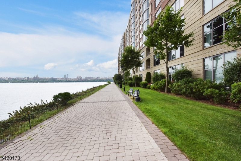 8100 River Road, Unit 210 North Bergen, NJ 07047 - Photo 25 of 25 a view of a lake with a building in the background