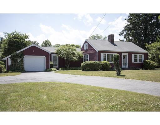 252 Converse Road Marion, MA 02738 - Photo 1 of 13 a house view with a garden space