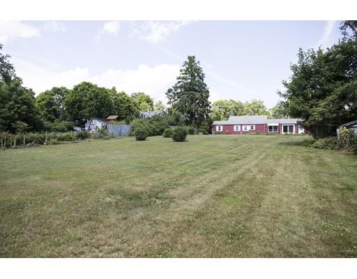 252 Converse Road Marion, MA 02738 - Photo 11 of 13 a view of a field with trees in the background