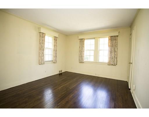 252 Converse Road Marion, MA 02738 - Photo 7 of 13 a view of an empty room with wooden floor and a window