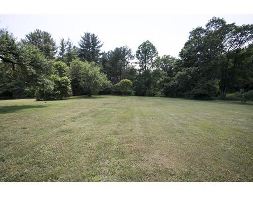 252 Converse Road Marion, MA 02738 - Photo 10 of 13 a view of a field with trees in the background