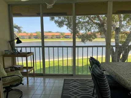 a living room with large windows