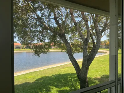 a kitchen with stainless steel appliances granite countertop a sink stove and microwave