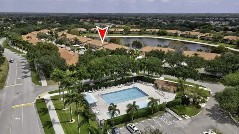 a lobby with furniture and potted plant