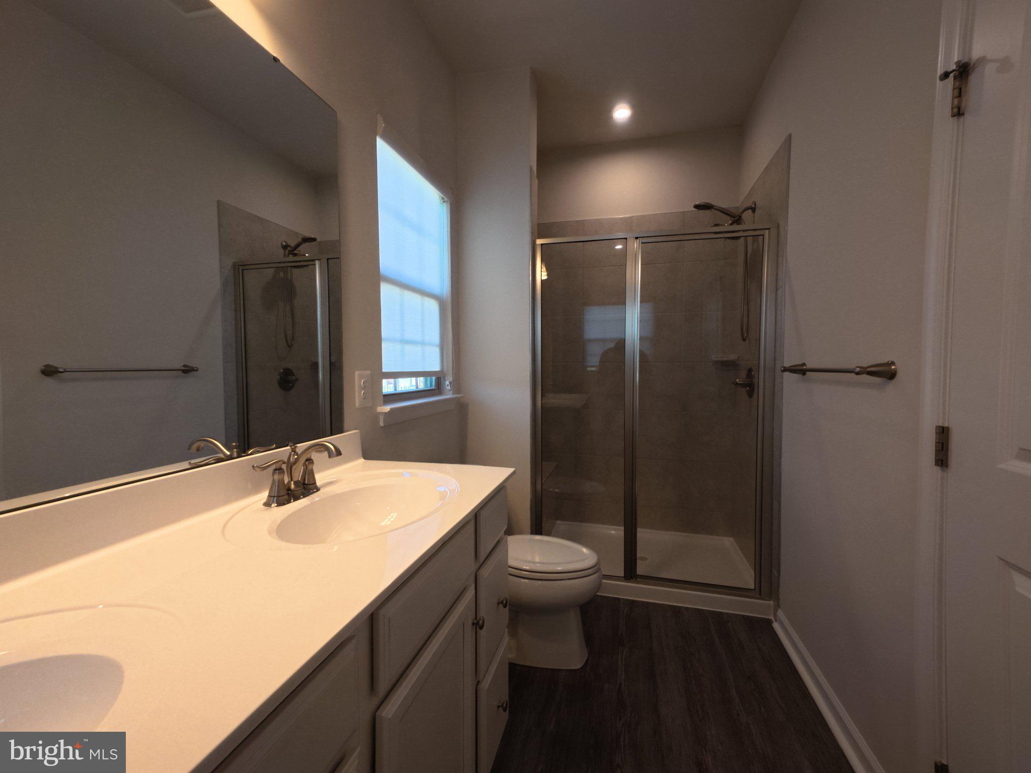 7838 Mine Run Road Hanover, MD 21076 - Photo 10 of 19 Modern bathroom with sleek finishes.