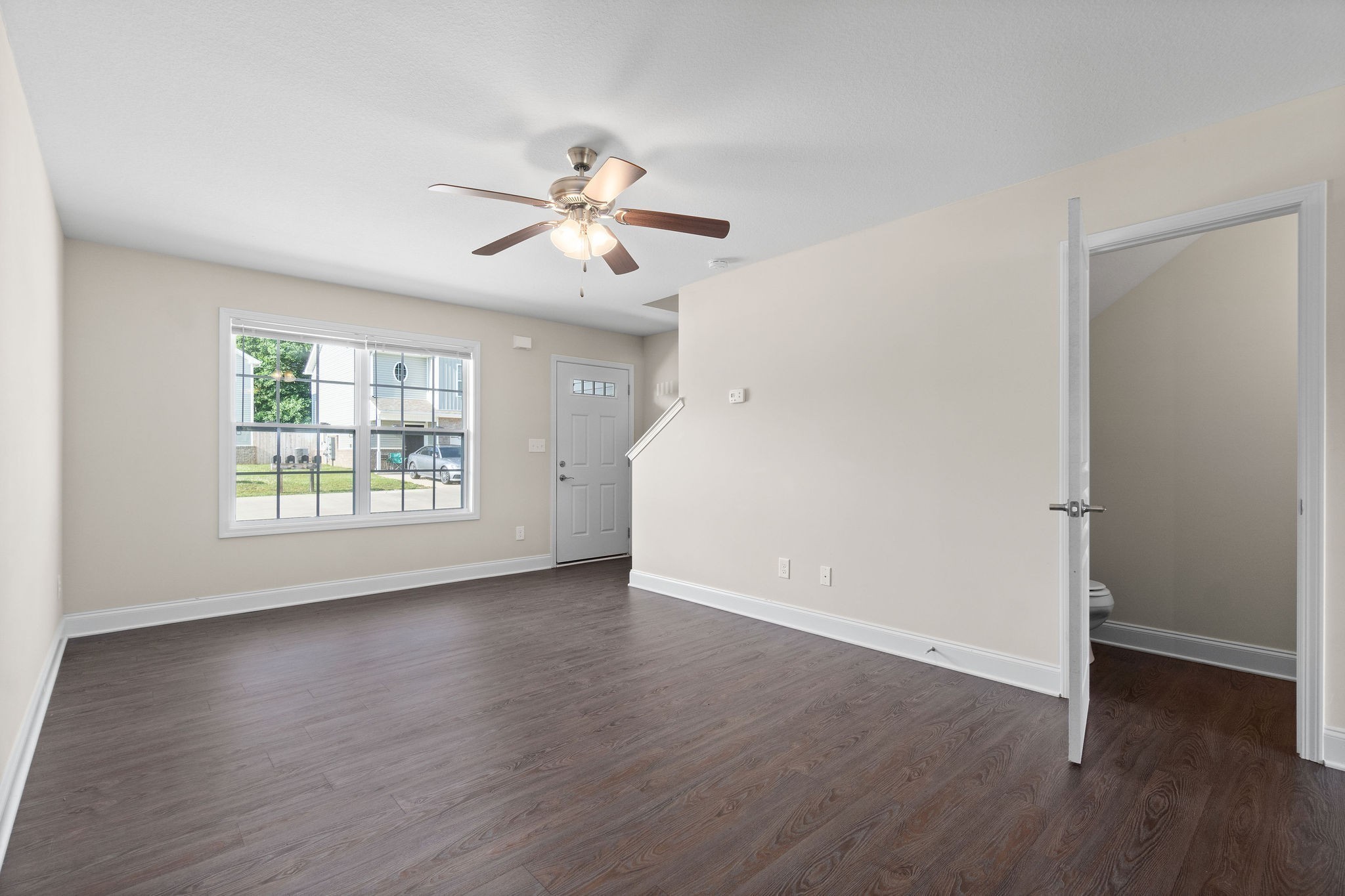 1552 Tylertown Road, Unit 610 Clarksville, TN 37040 - Photo 6 of 24 a view of empty room with wooden floor and fan
