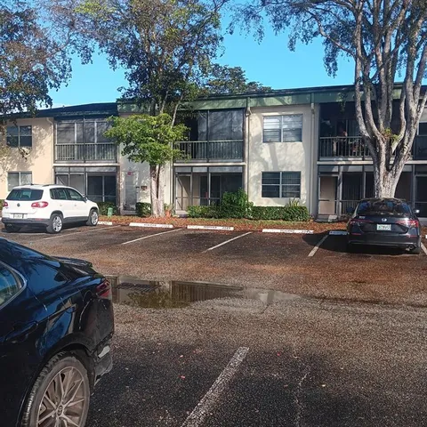 a cars parked in front of a house