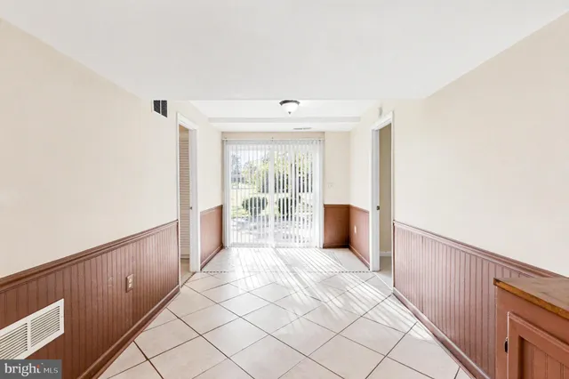 a view of a room with windows