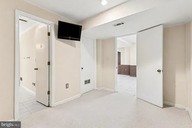 a view of a livingroom with a bathroom