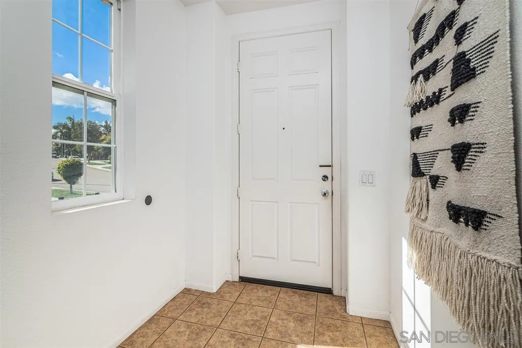 3506 Rock Ridge Road Carlsbad, CA 92010 - Photo 2 of 25 a view of a bathroom with a window
