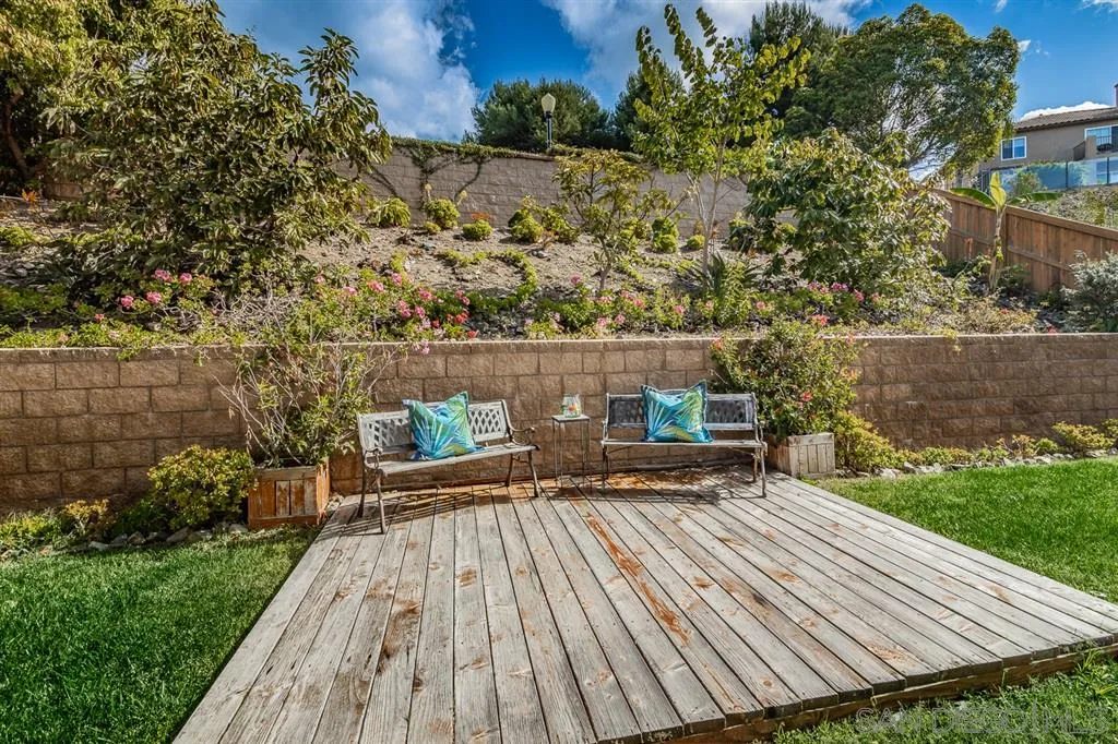 3506 Rock Ridge Road Carlsbad, CA 92010 - Photo 23 of 25 a view of house with yard outdoor seating and city view