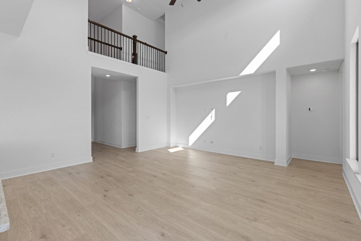 1409 Treasure Map View Leander, TX 78641 - Photo 16 of 40 Family Room with soaring ceiling