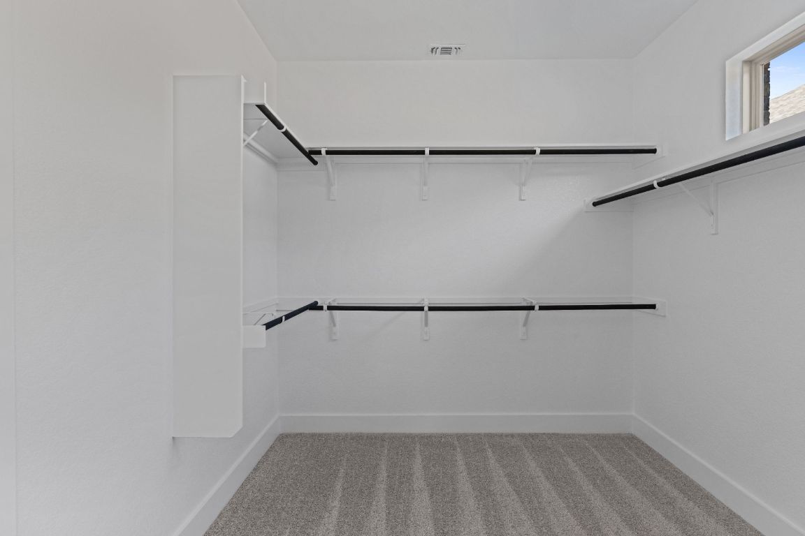 1409 Treasure Map View Leander, TX 78641 - Photo 25 of 40 Walk-in closet in Primary Bedroom