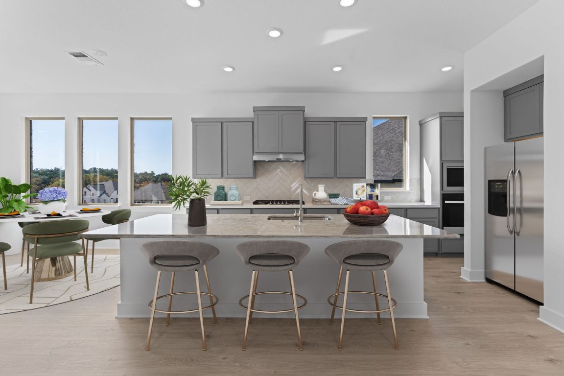 1409 Treasure Map View Leander, TX 78641 - Photo 3 of 40 Light & Bright Kitchen - Virtually Staged