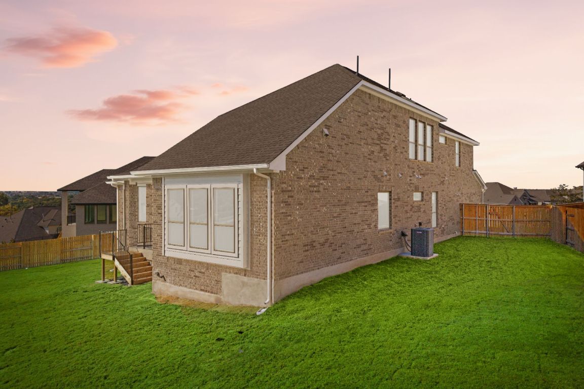 1409 Treasure Map View Leander, TX 78641 - Photo 36 of 40 Rear of Home and Private Backyard