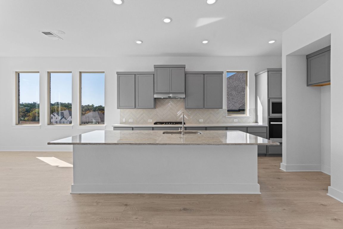 1409 Treasure Map View Leander, TX 78641 - Photo 6 of 40 Gorgeous Open Concept Kitchen