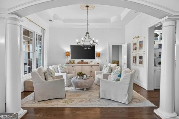 a large living room with furniture
