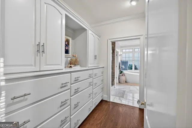 a bathroom with a sink and mirror