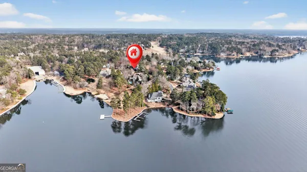 an aerial view of houses with outdoor space