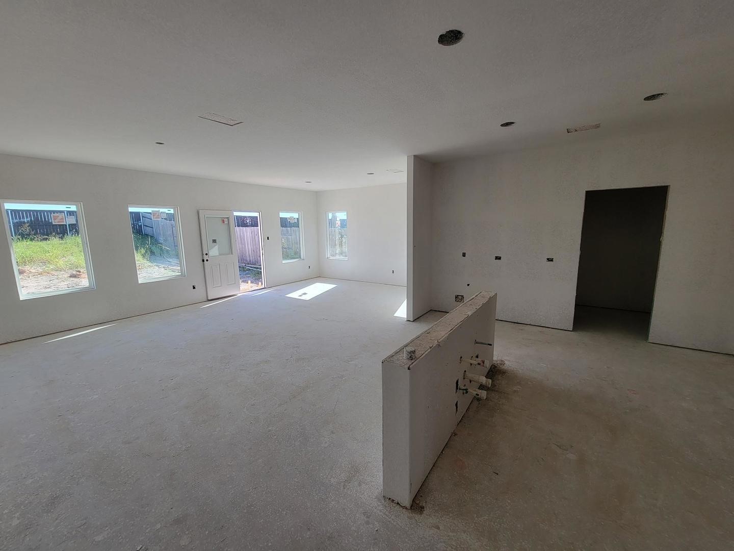 5509 Sacra Cove Austin, TX 78747 - Photo 13 of 38 a large room with a lot of cabinets