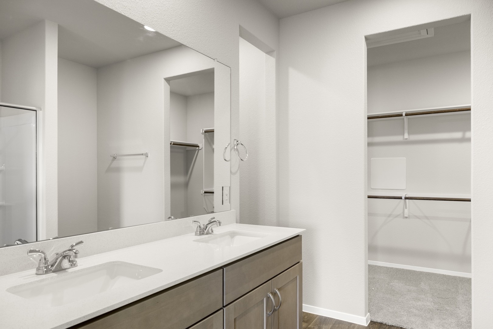 5509 Sacra Cove Austin, TX 78747 - Photo 30 of 38 a bathroom with a sink and a mirror