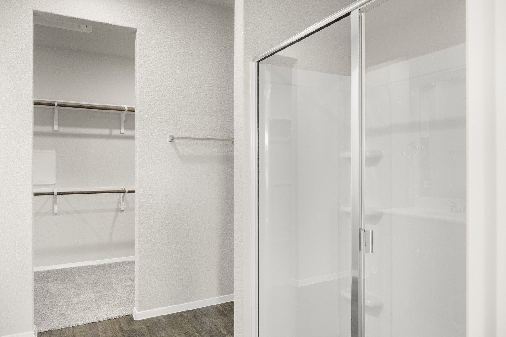 5509 Sacra Cove Austin, TX 78747 - Photo 31 of 38 a bathroom with a glass shower door