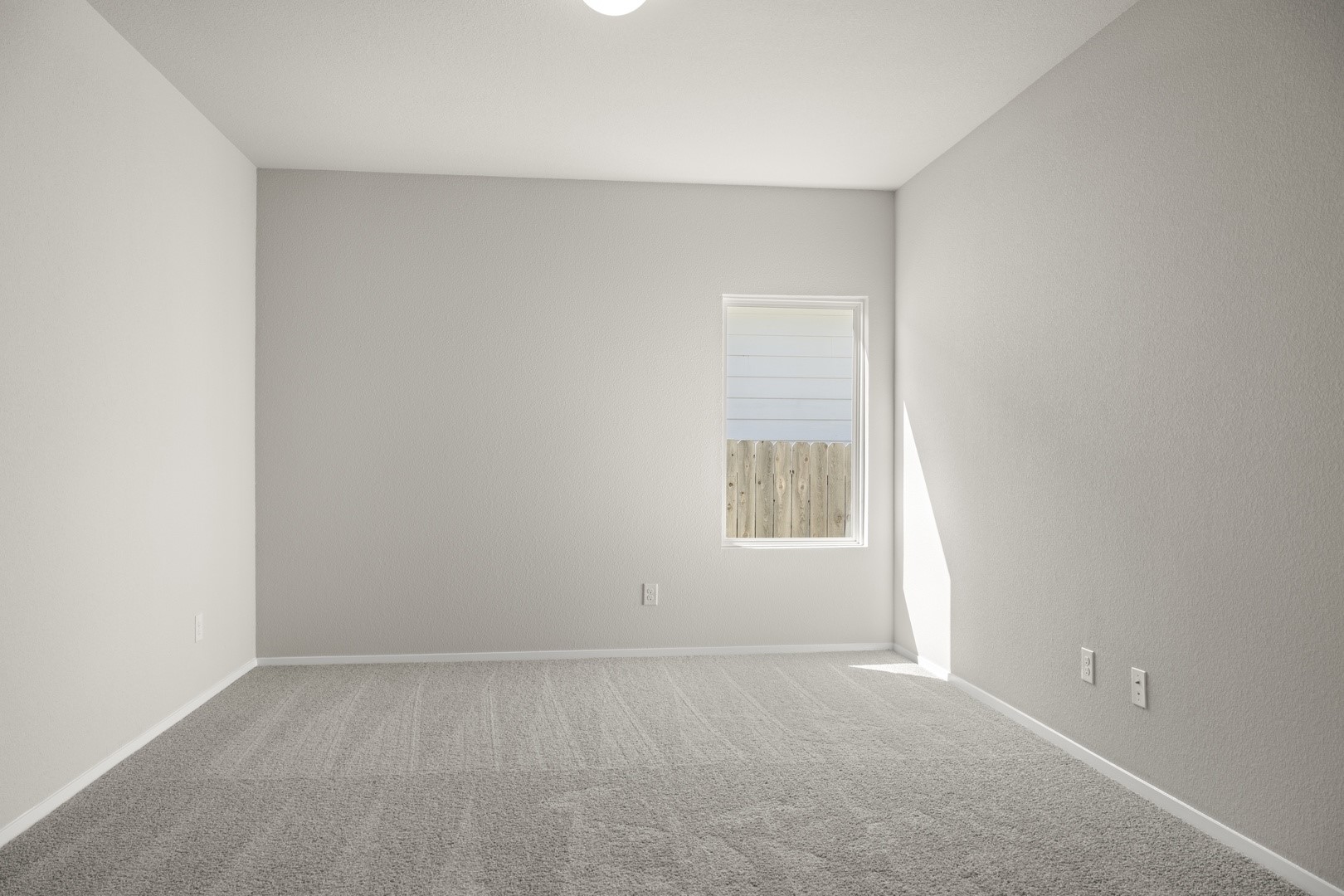 5509 Sacra Cove Austin, TX 78747 - Photo 33 of 38 an empty room with a window