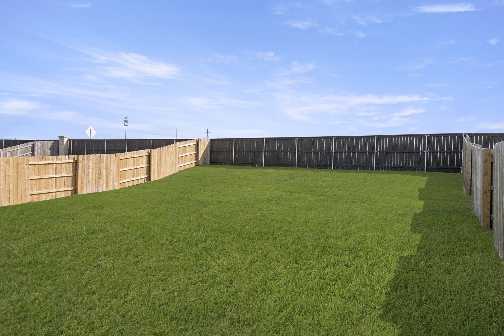 5509 Sacra Cove Austin, TX 78747 - Photo 37 of 38 a view of a backyard with a large trees