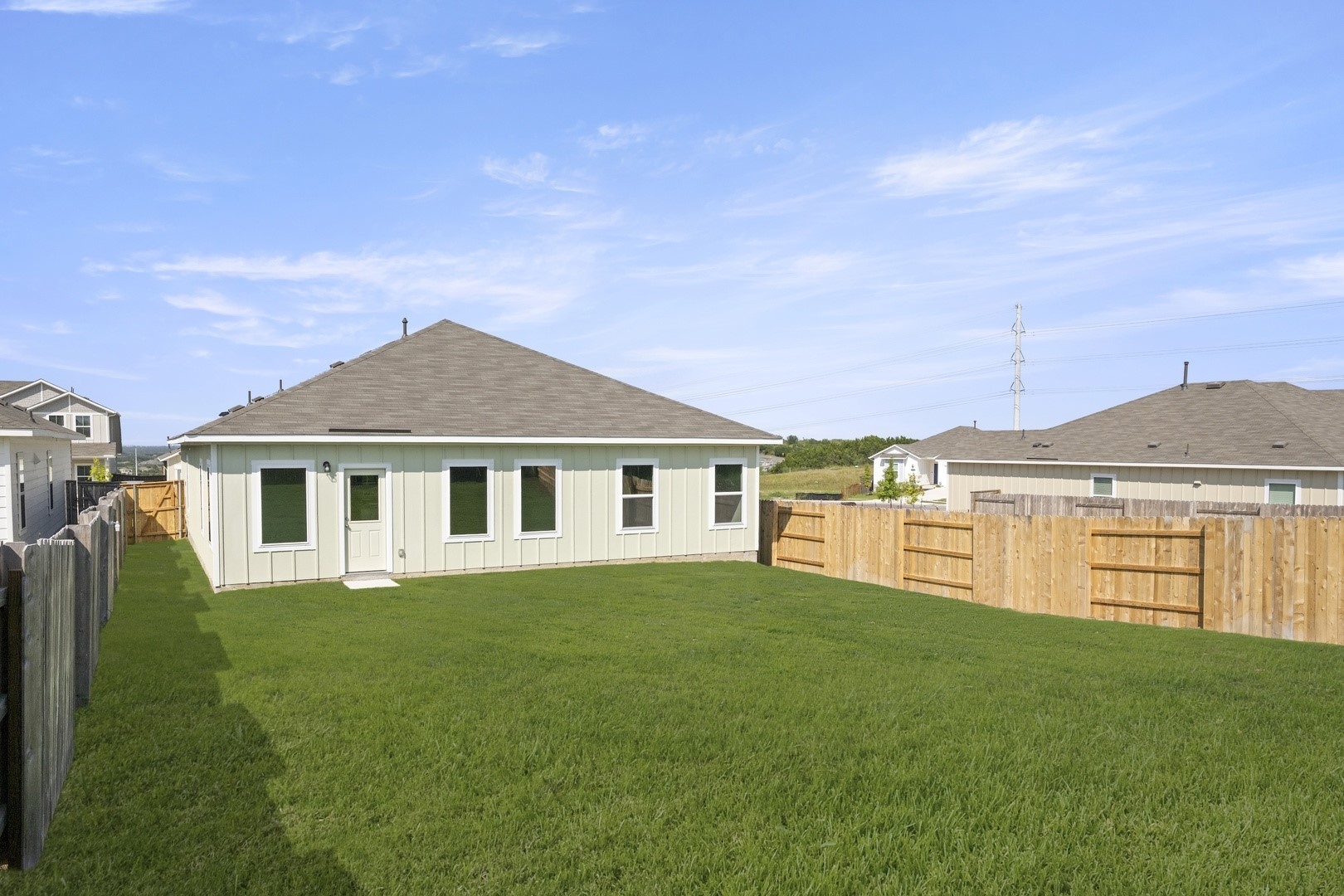5509 Sacra Cove Austin, TX 78747 - Photo 38 of 38 a front view of a house with a yard