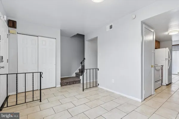 a view of a hallway with closet area