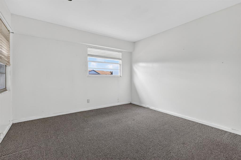 650 Southwest 124th Terrace, Unit 404P Pembroke Pines, FL 33027 - Photo 13 of 26 a view of an empty room