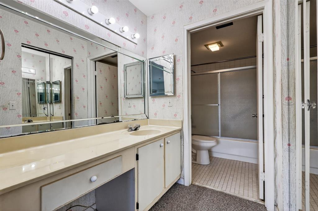 650 Southwest 124th Terrace, Unit 404P Pembroke Pines, FL 33027 - Photo 15 of 26 a bathroom with a sink a toilet and shower