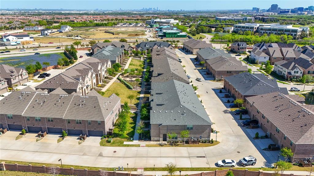 631 Cobblestone Lane Irving, TX 75039 - Photo 32 of 32 an aerial view of residential houses with outdoor space and ocean view