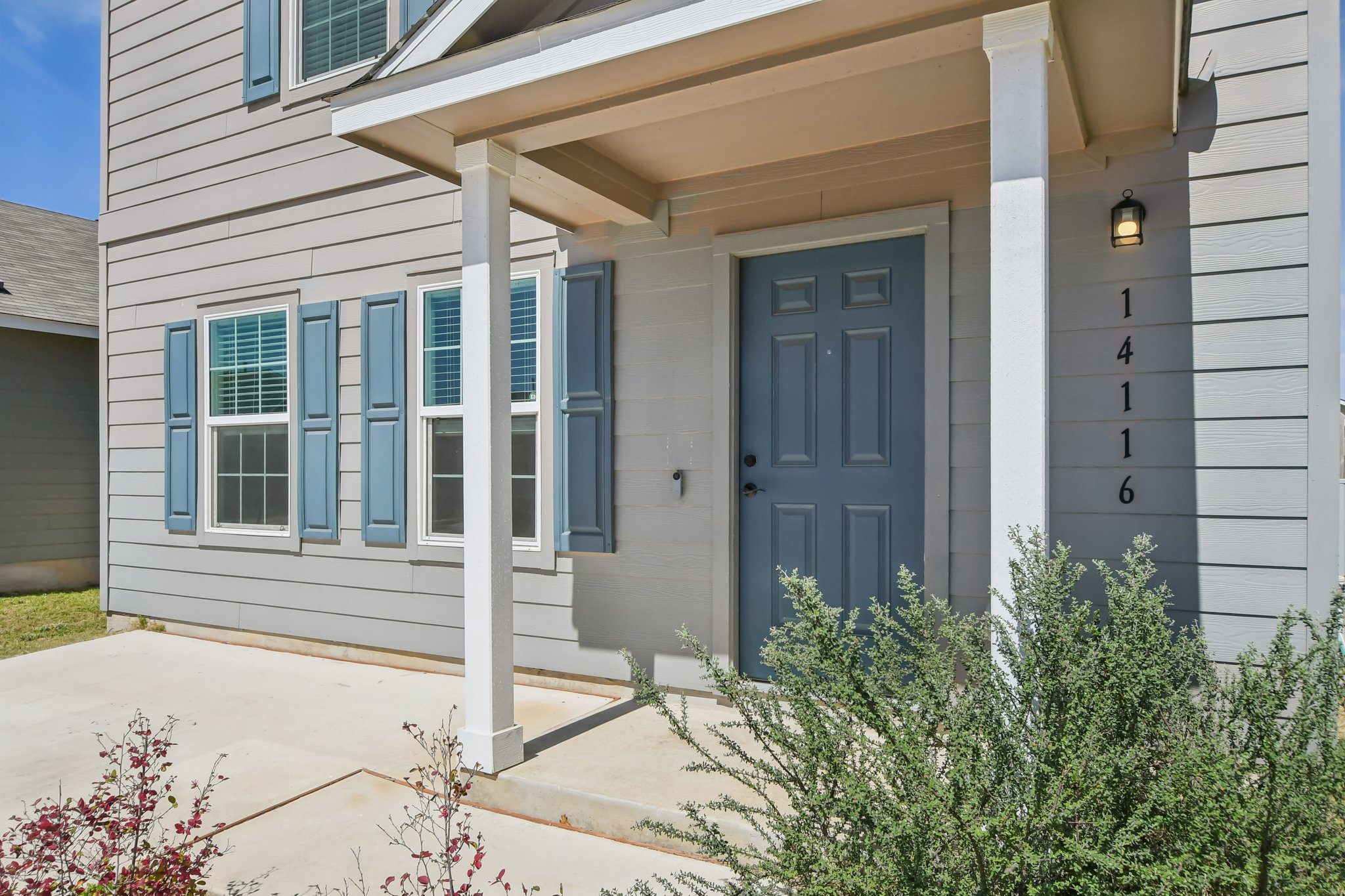 14116 Mussel Run Elgin, TX 78621 - Photo 24 of 25 View of exterior entry featuring a porch