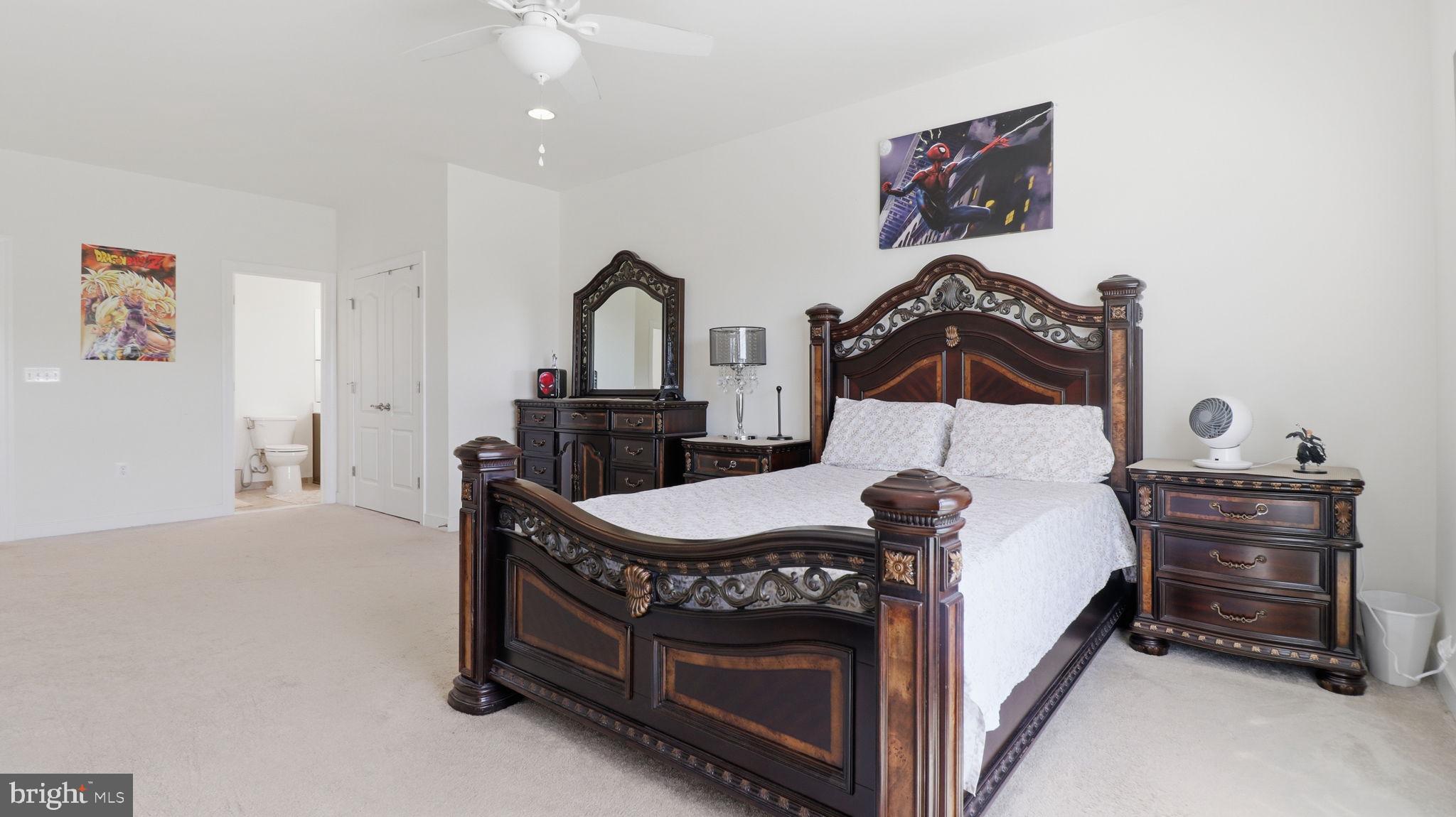 11502 Aden Road Nokesville, VA 20181 - Photo 60 of 106 a bedroom with furniture and a bed