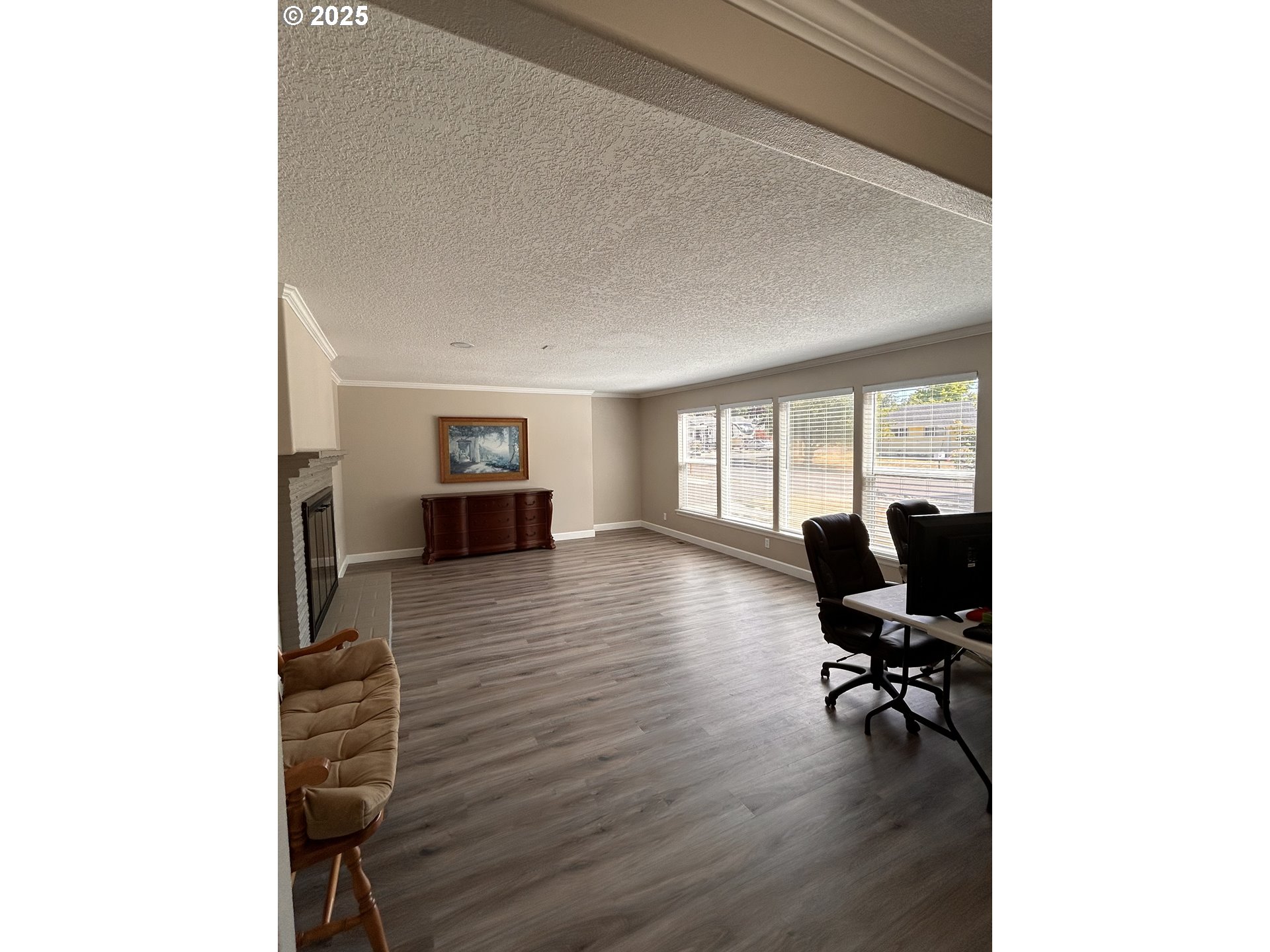 1305 Northeast Newall Road Newberg, OR 97132 - Photo 5 of 21 a view of a workspace with furniture and a window