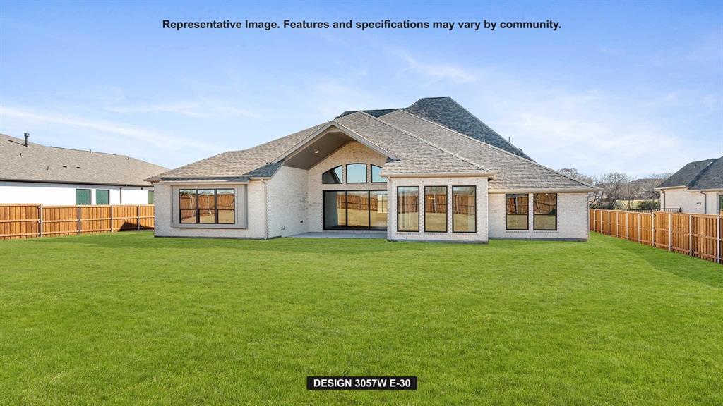 1908 Vantage Drive Rockwall, TX 75087 - Photo 10 of 17 a view of a big yard with a house